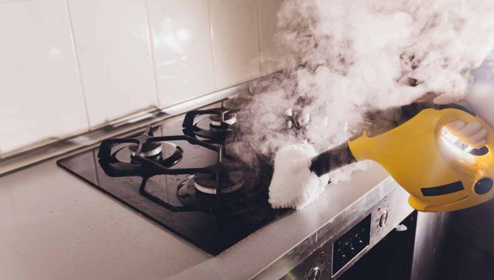 Steam cleaning on the kitchen stove